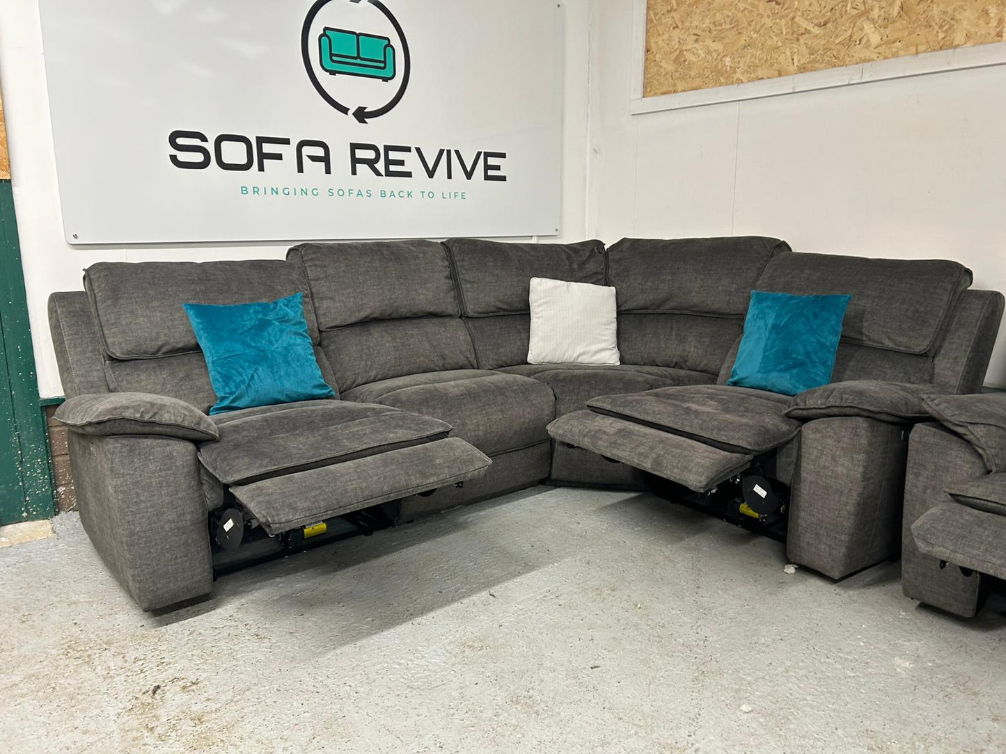Grey corner recliner with matching recliner armchair