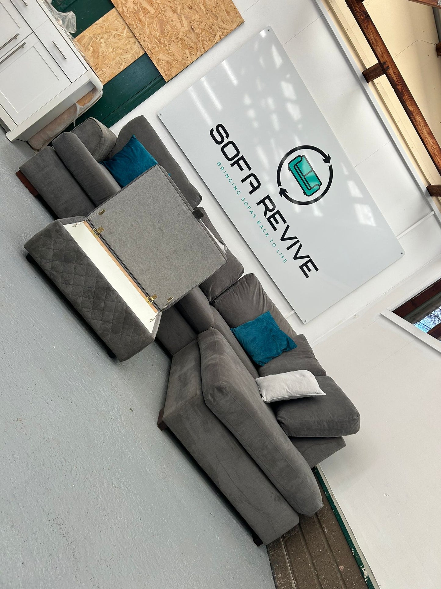 Grey DFS Orka corner sofa with matching storage footstool