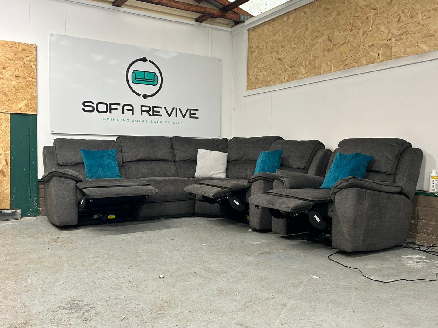 Grey corner recliner with matching recliner armchair